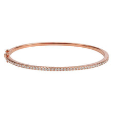 This bracelet features pave set round brilliant cut diamonds that t...