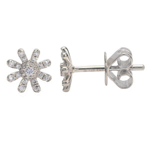 These earrings feature round brilliant cut diamonds that total .10cts.