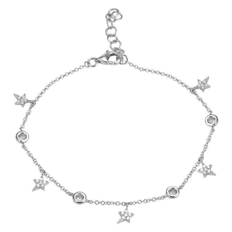 This bracelet features diamond star dangles with .26cts of round br...