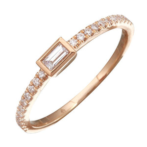 This ring features baguette and round brilliant cut diamonds that t...