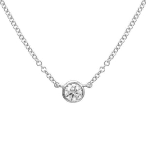 This necklace features a bezel set round brilliant cut diamond that...