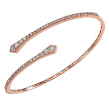 This diamond cuff bracelet features round brilliant cut diamonds th...