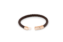 








The tightly woven, brown, Italian leather bracelet is crea...