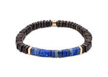 








Ebony and palm wood beads are accented by rose gold-colour...