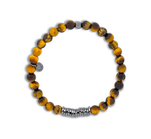 








Tiger eye beads are paired with hand-polished, black rhodi...