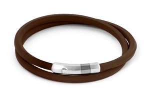 








This geometric bracelet uses brown faceted rubber for a ca...