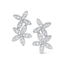 These earrings feature round brilliant cut diamonds that total .27cts.