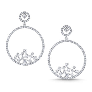 These earrings feature round brilliant cut diamonds that total .99cts.