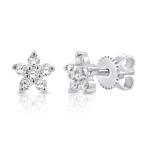 These earrings feature round brilliant cut diamonds that total .14cts.