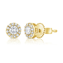 These stud earrings feature .21cts of round brilliant cut diamonds.