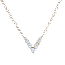 Mini 'V' shaped pendant featuring 7 round brilliant cut diamonds to...
