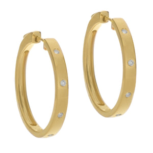 flat yellow gold hoops with diamonds totaling .15ct