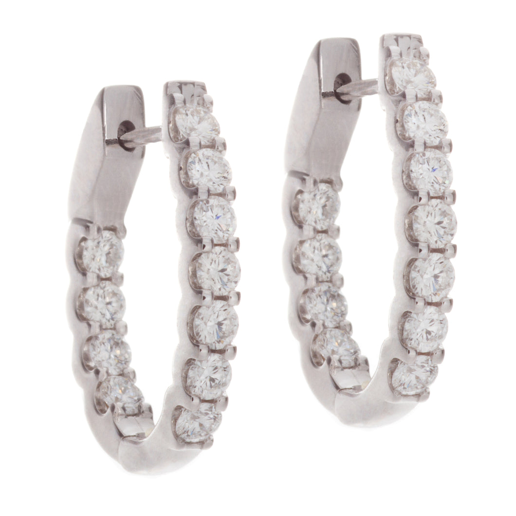 oval shaped hoops with 22 diamonds totaling .95ct