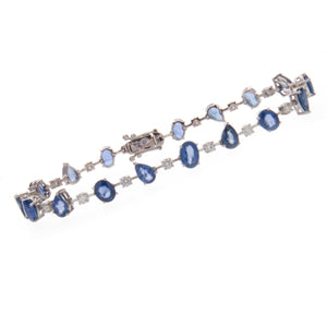 this bracelet features both oval cut and pear shape sapphires with ...