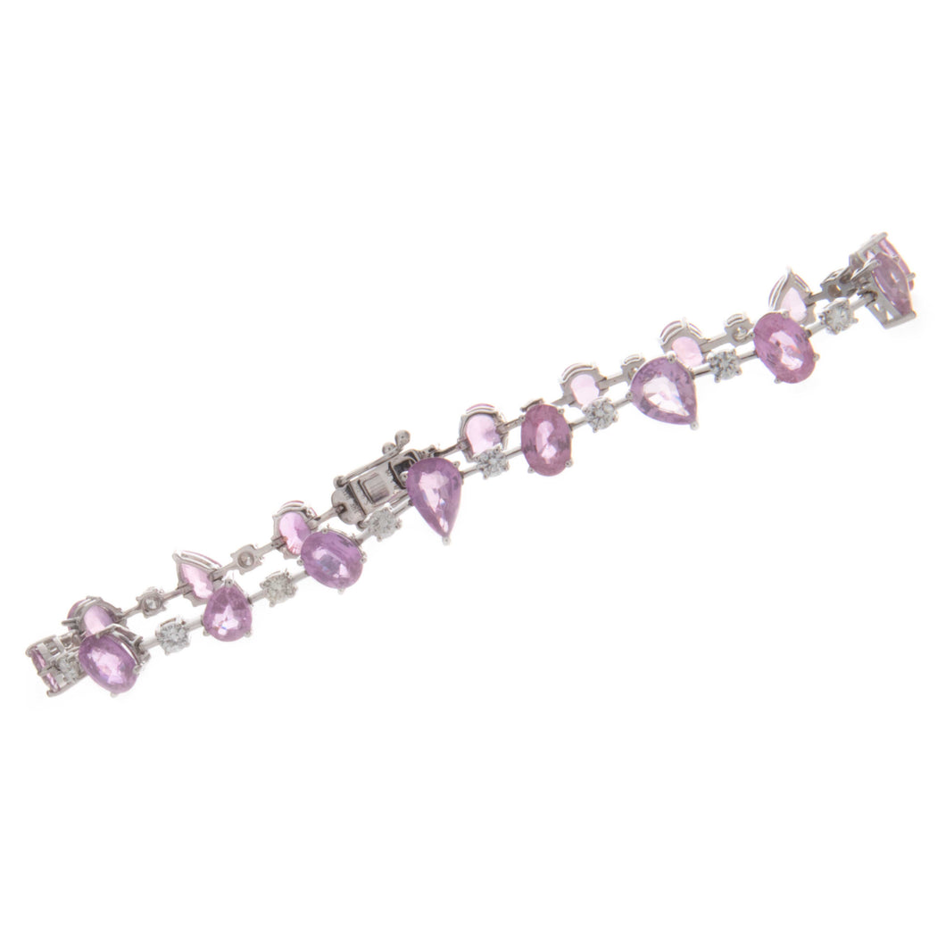 this bracelet features both oval cut and pear shape sapphires with ...