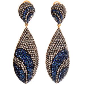 These vintage inspired earrings feature diamonds and sapphires in d...