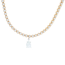 This elegant tennis style necklace features a pear shape diamond pe...