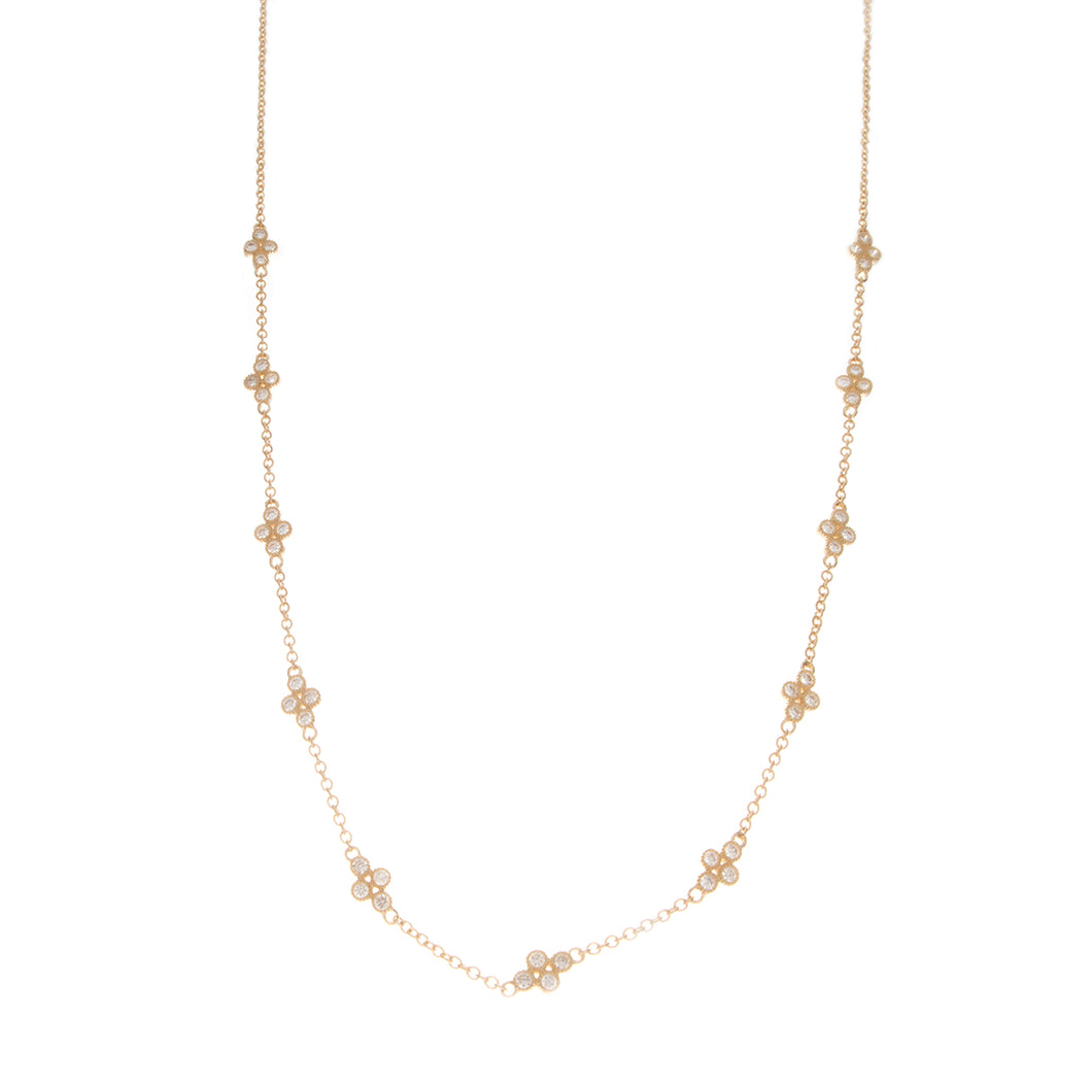station necklace features diamond clusters totaling .72ct