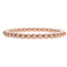 Stretch beaded bracelet available in yellow gold and rose gold.