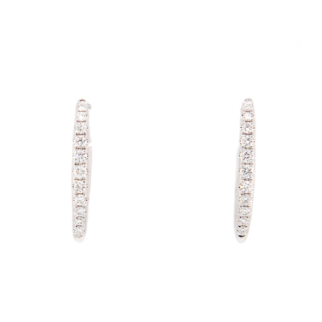 These small hoops feature diamonds totaling .15ct
