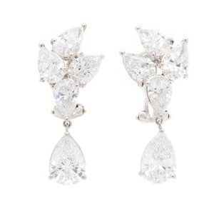 These stunning drop earrings features 10 pear shape diamonds totali...