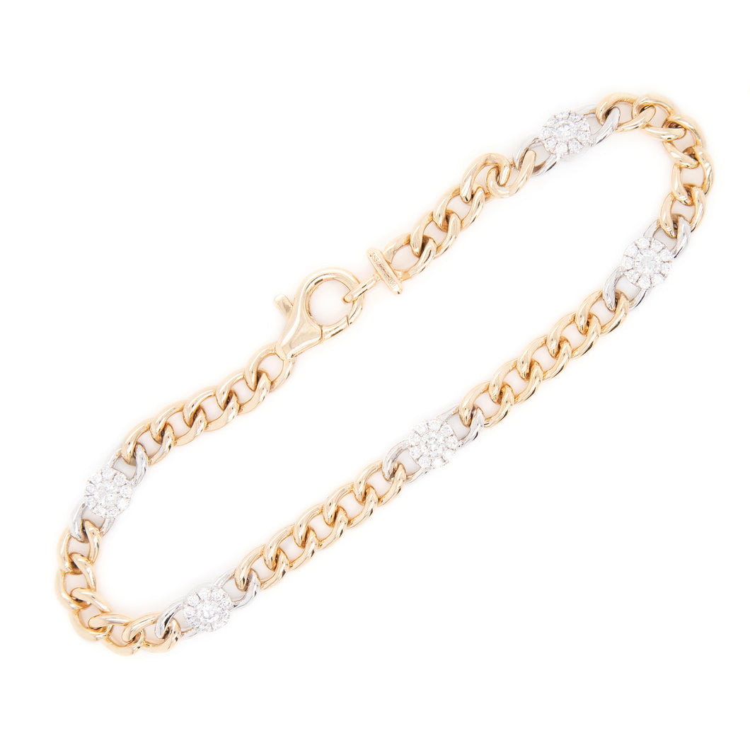 This yellow and white gold link bracelet features pave-set diamonds...