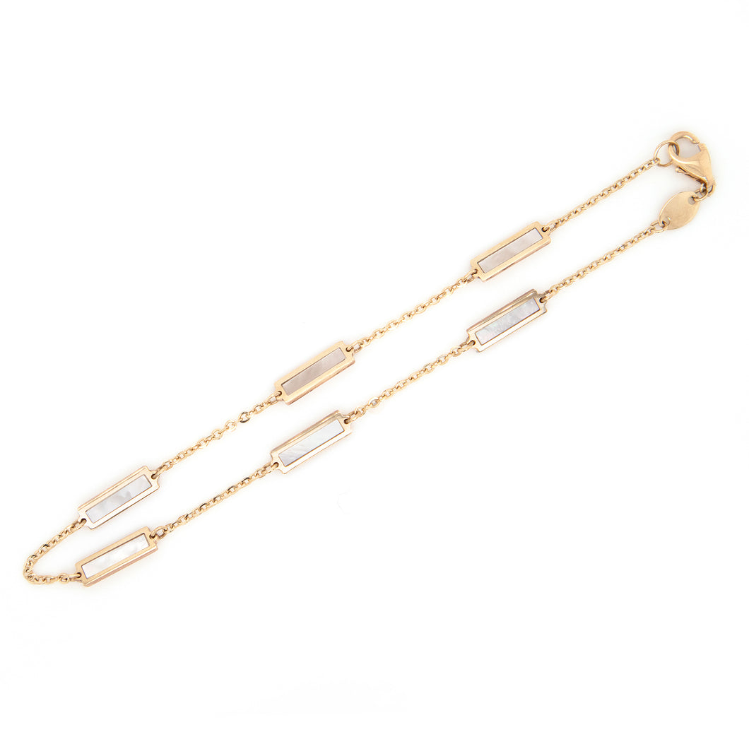 14k yellow gold bracelet with 6 mother of pearl inlays.