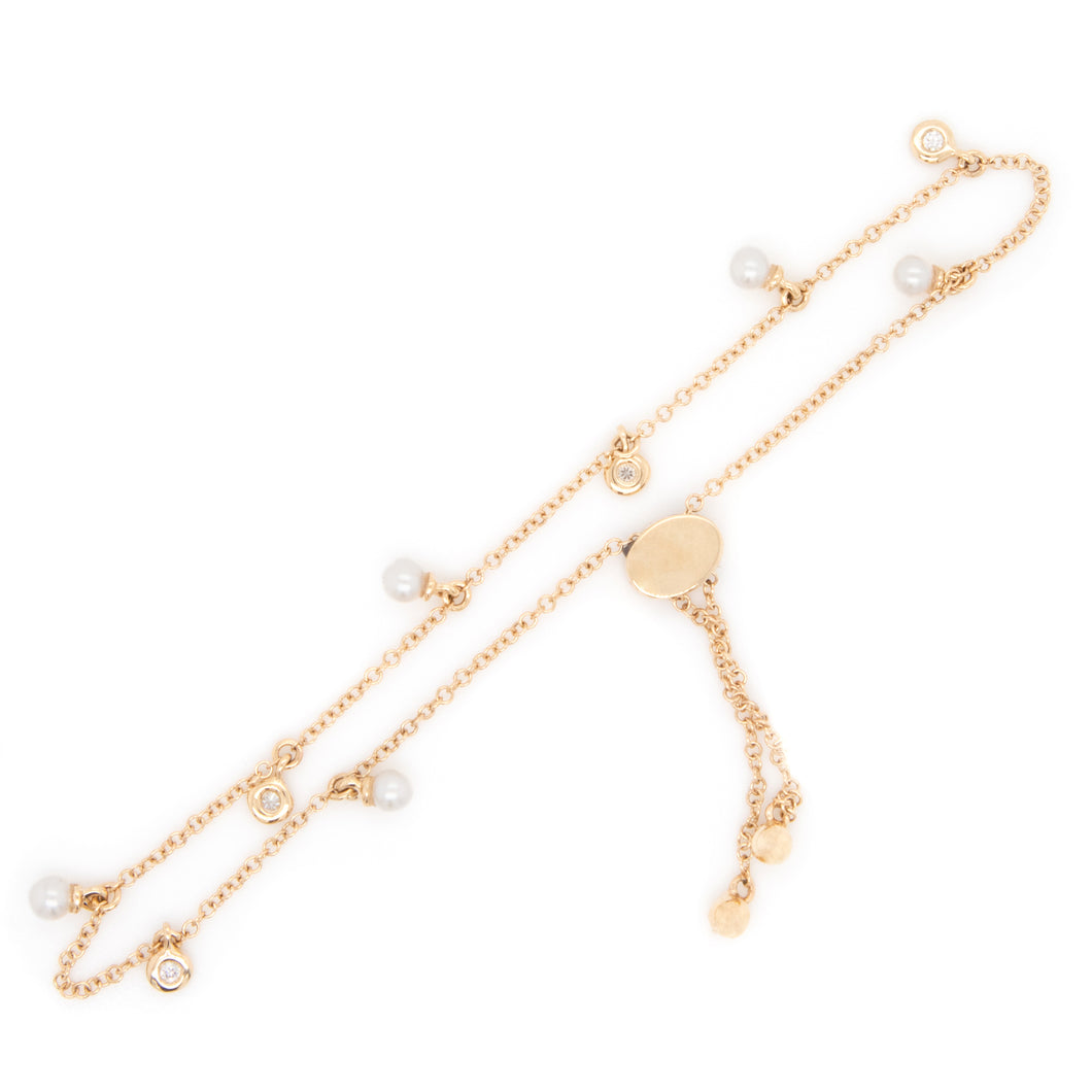 sweet bracelet in yellow gold, with alternating pearls and bezel se...