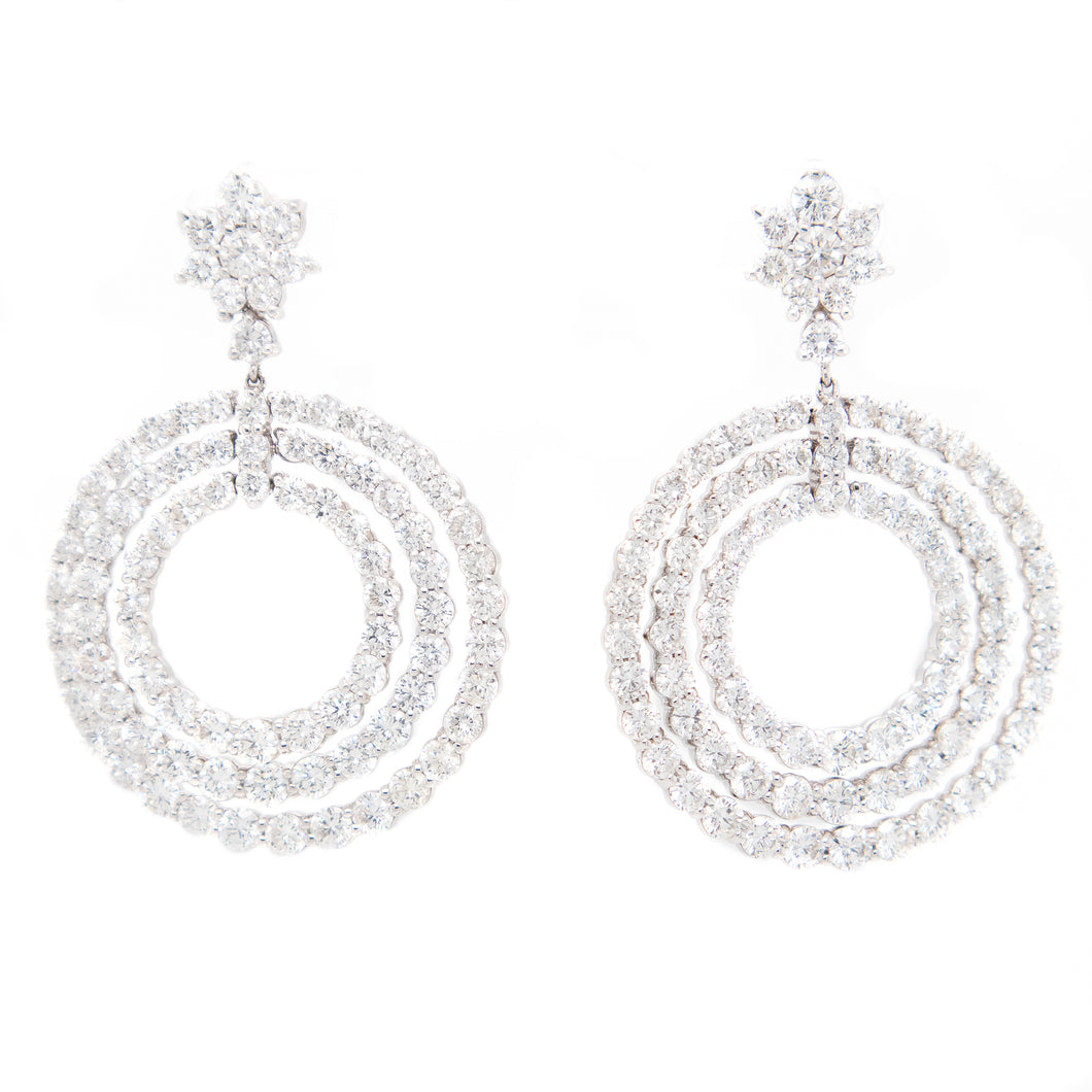 The stunning earrings feature 178 round brilliant cut diamonds in t...