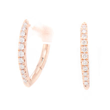 these v hoops feature diamonds totaling .15ct along the front of th...