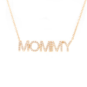 This necklace features a 'mommy' pendant with pave-set diamonds tot...