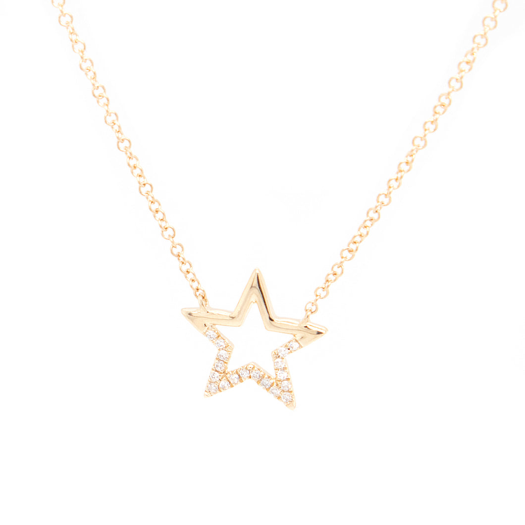 This modern necklace features a star pendant with diamonds totaling...