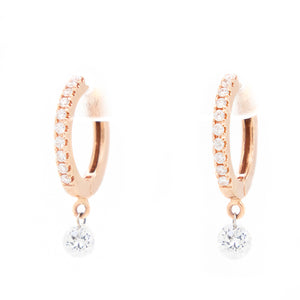 Huggy hoops featuring diamonds totaling .61ct