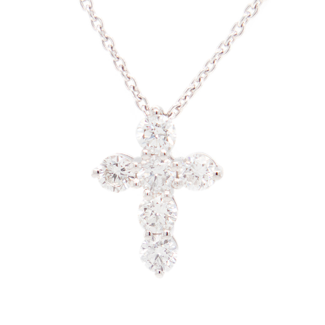 this necklace features a small cross pendant with 6 round brilliant...