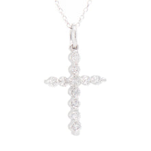 this necklace features a cross pendant featuring 11 round brilliant...