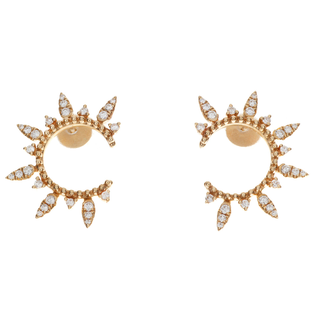 these magical earrings feature round brillinat cut diamonds totalin...