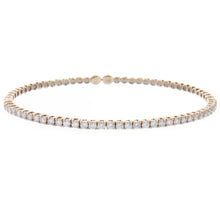 this easy to stack and style bangle features 35 round brilliant cut...