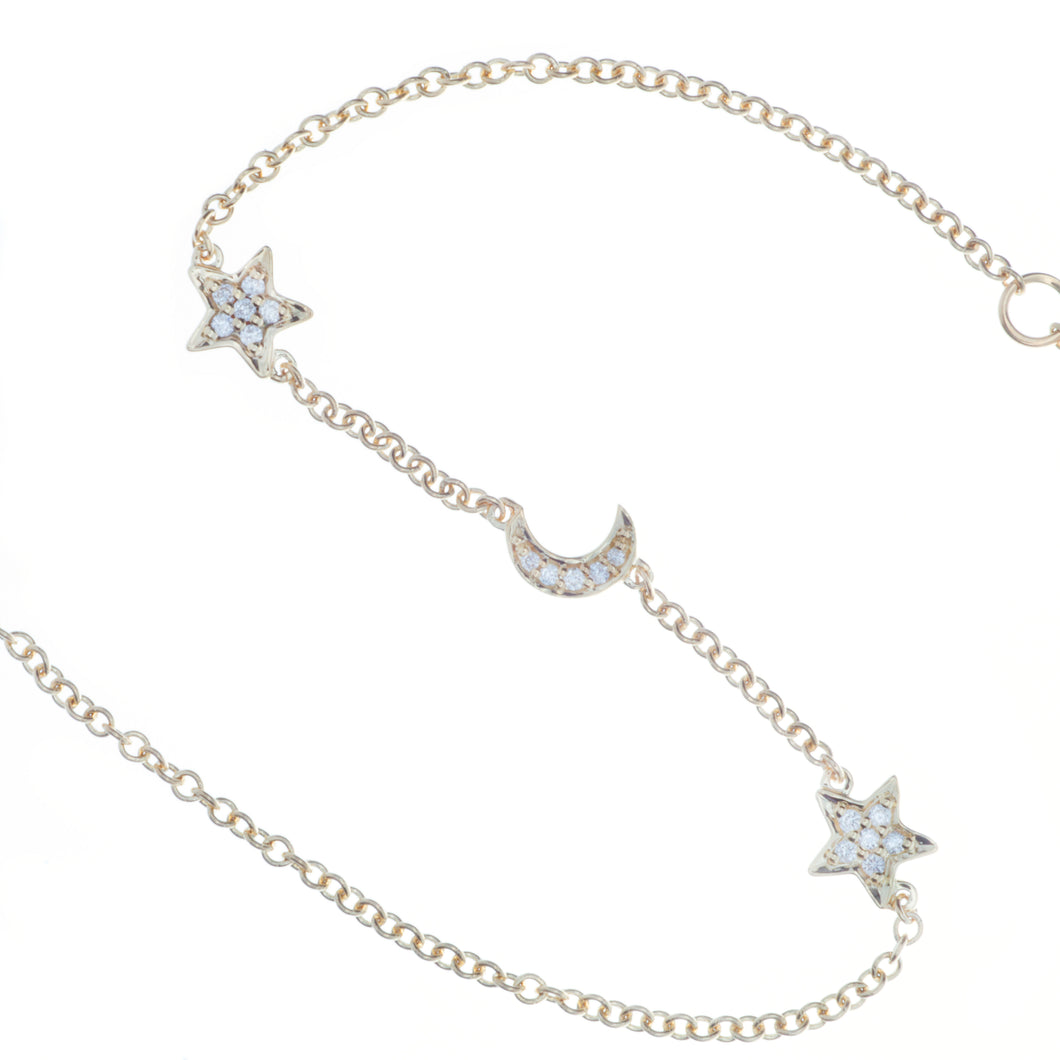 This simple and sweet bracelet features celestial charms with pave-...