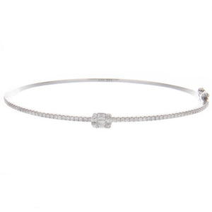 This classic bangle features 8 baguette cut diamonds totaling .08ct...
