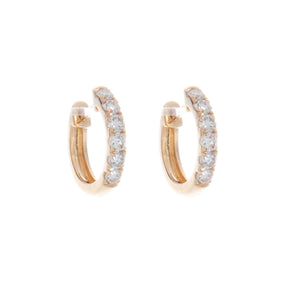 These small huggy hoops feature pave-set diamonds totaling .44ct. A...