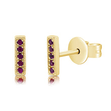 These bar earrings feature 10 pave set round rubies.