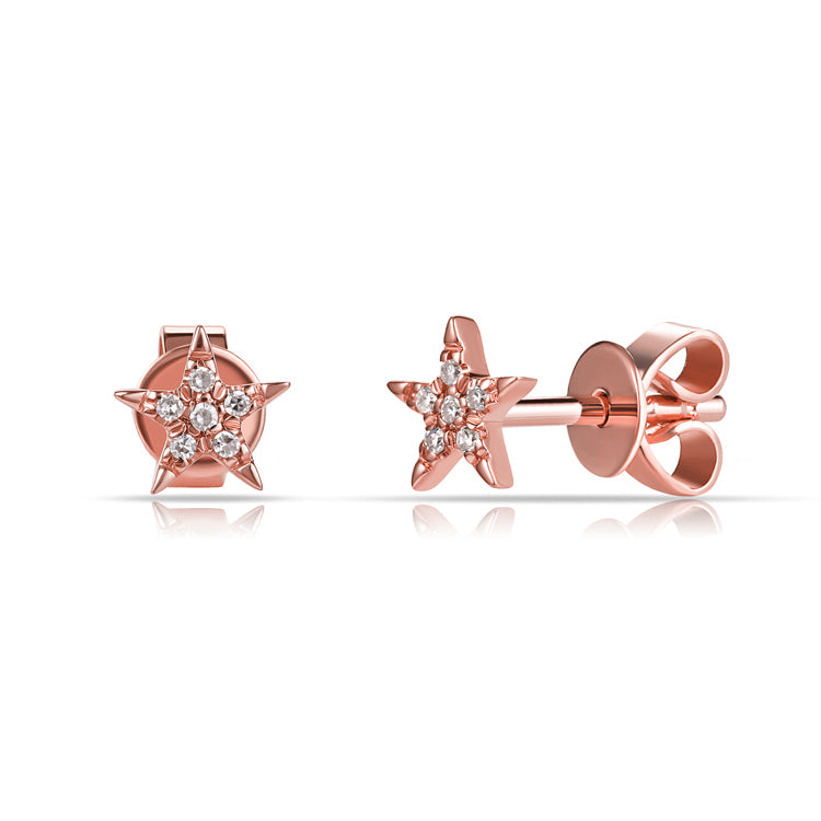 These star earrings feature .03cts of round brilliant cut diamonds.