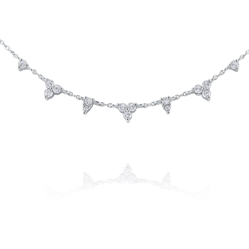 This diamond necklace features round brilliant cut diamonds that to...