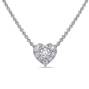 This necklace features a pave heart in the center that totals .61cts.