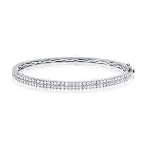 This bangle features pave set round brilliant cut diamonds that tot...