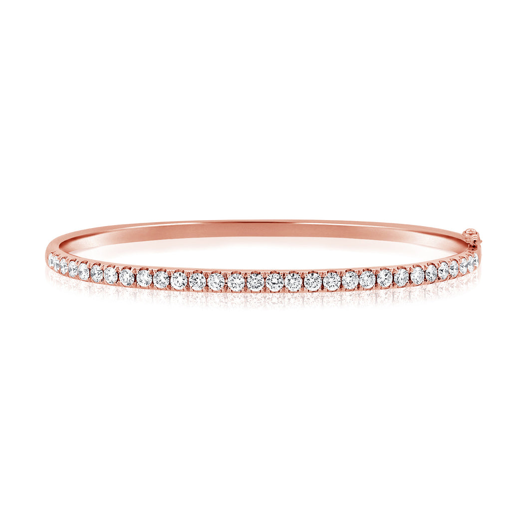 This bangle features pave set round brilliant cut diamonds that tot...