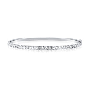 This bangle features pave set round brilliant cut diamonds that tot...