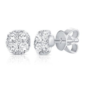 These earrings features round brilliant cut diamonds that total .97...