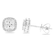 These earrings features round brilliant cut diamonds that total .75...