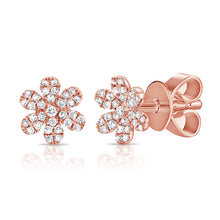 These earrings feature round briliant cut diamonds that total .37cts.